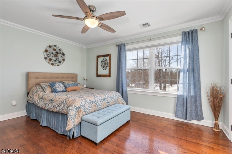 177 Maple Street Bridgewater, NJ 08807 - Photo 22 of 37 a bedroom with a large bed and a window