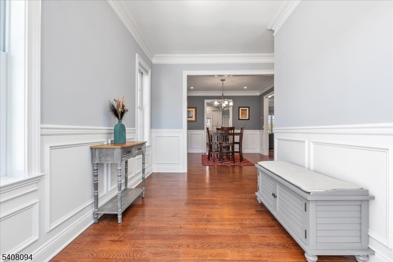 177 Maple Street Bridgewater, NJ 08807 - Photo 3 of 37 a living room with furniture and a wooden floor