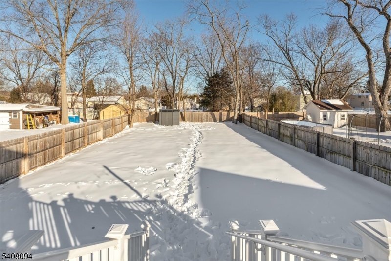 177 Maple Street Bridgewater, NJ 08807 - Photo 35 of 37 a view of residential houses with snow and trees