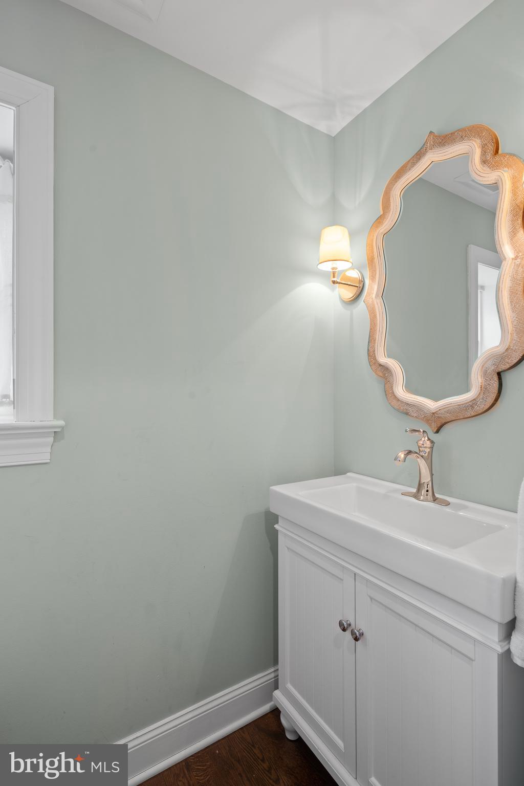 115 Barcladen Road Bryn Mawr, PA 19010 - Photo 15 of 39 a bathroom with a sink and mirror