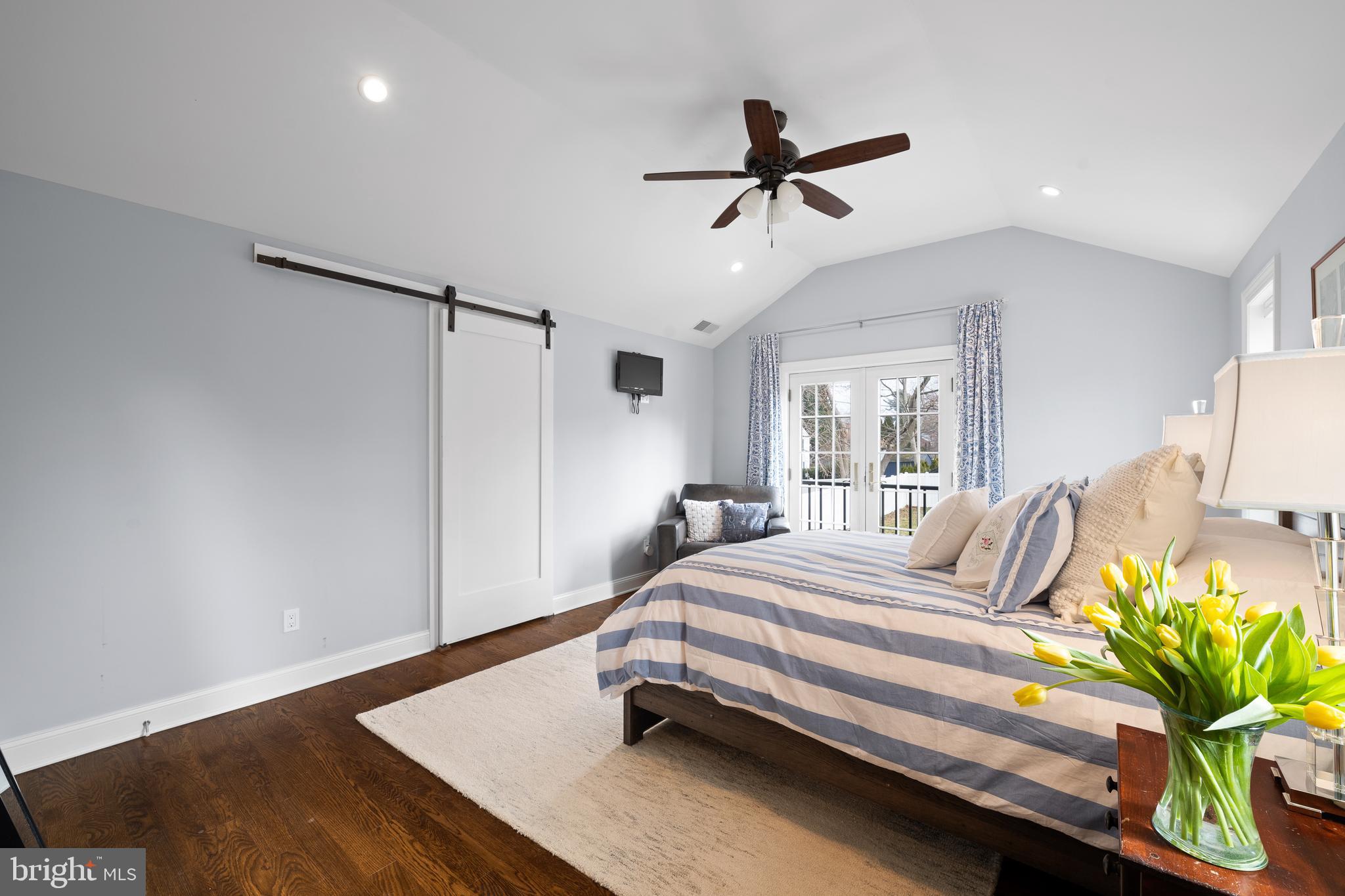 115 Barcladen Road Bryn Mawr, PA 19010 - Photo 26 of 39 a bedroom with a bed and wooden floor