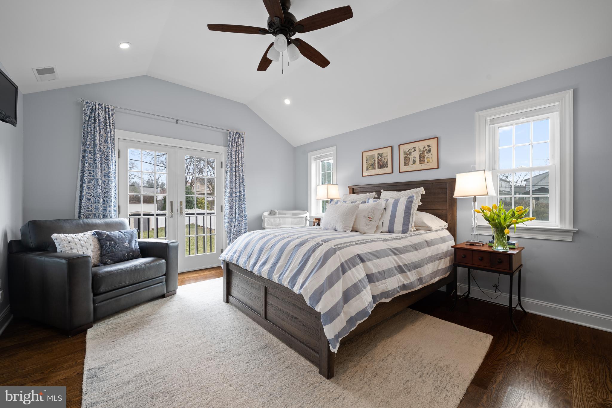 115 Barcladen Road Bryn Mawr, PA 19010 - Photo 27 of 39 a spacious bedroom with a bed couch and a window