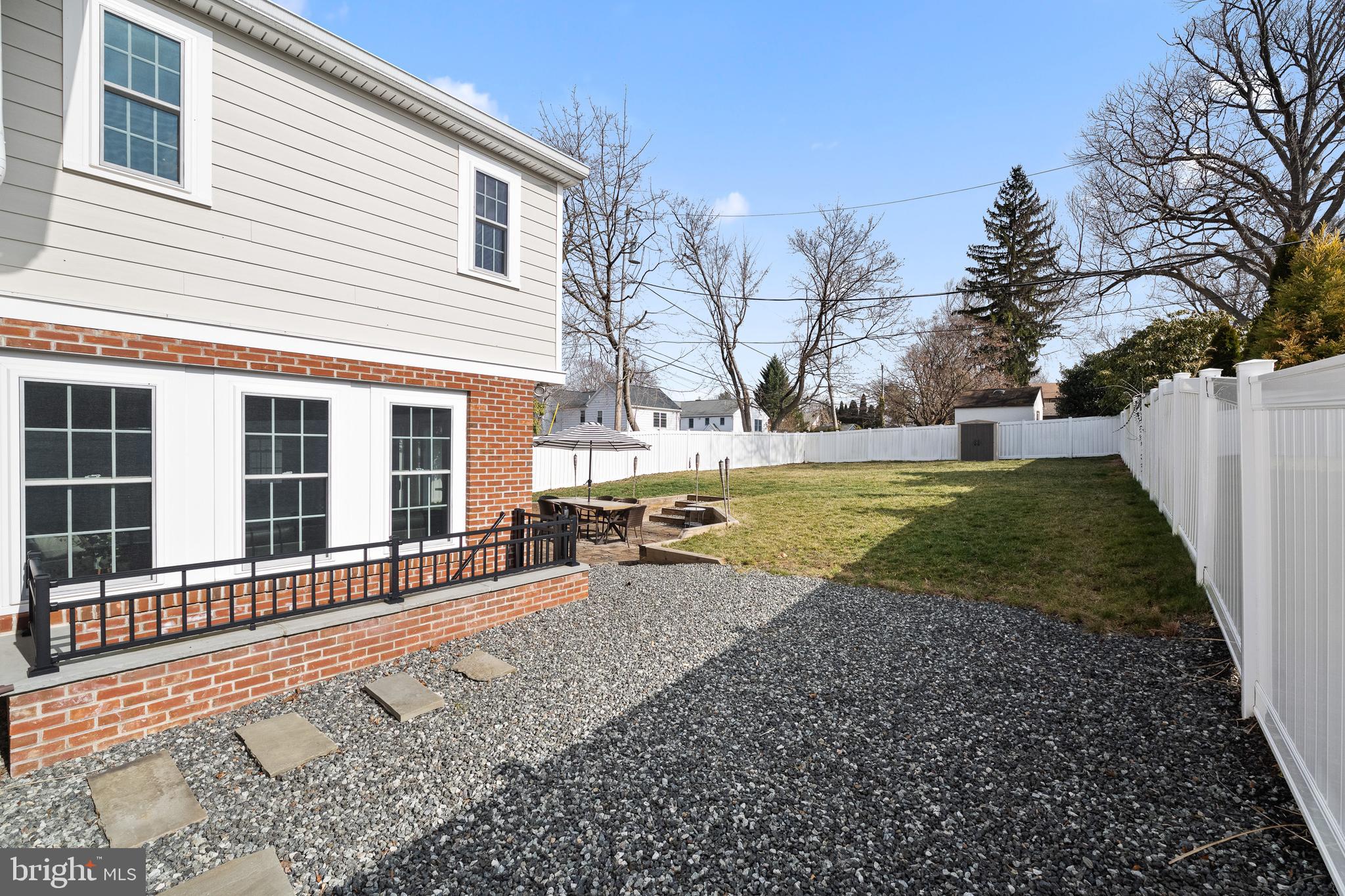 115 Barcladen Road Bryn Mawr, PA 19010 - Photo 35 of 39 a view of a house with backyard and sitting area