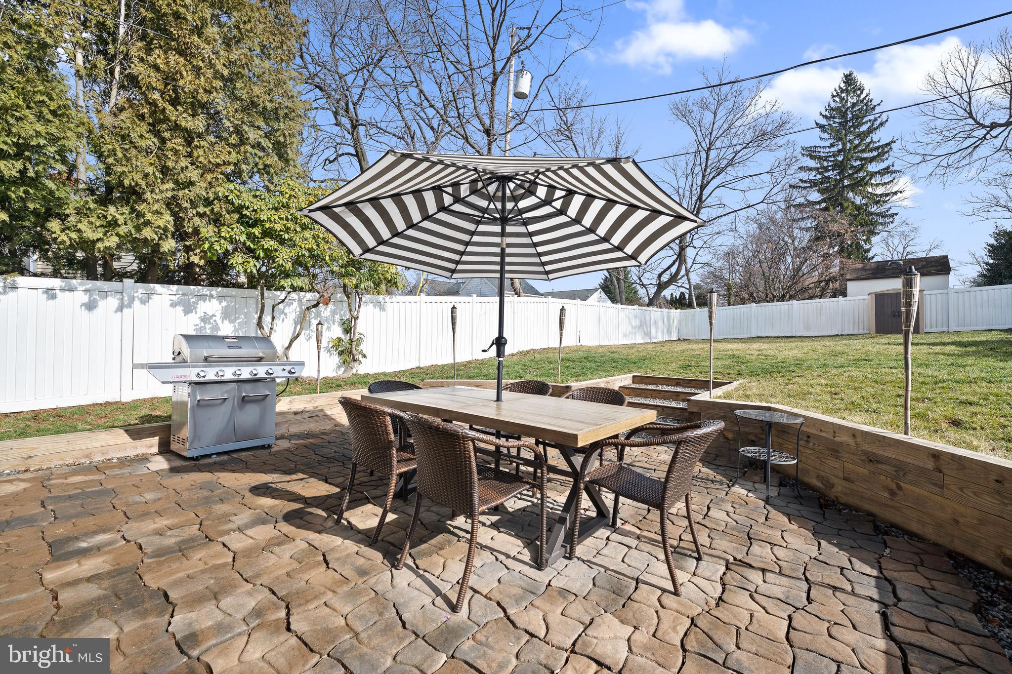 115 Barcladen Road Bryn Mawr, PA 19010 - Photo 36 of 39 a view of a patio with table and chairs and potted plants