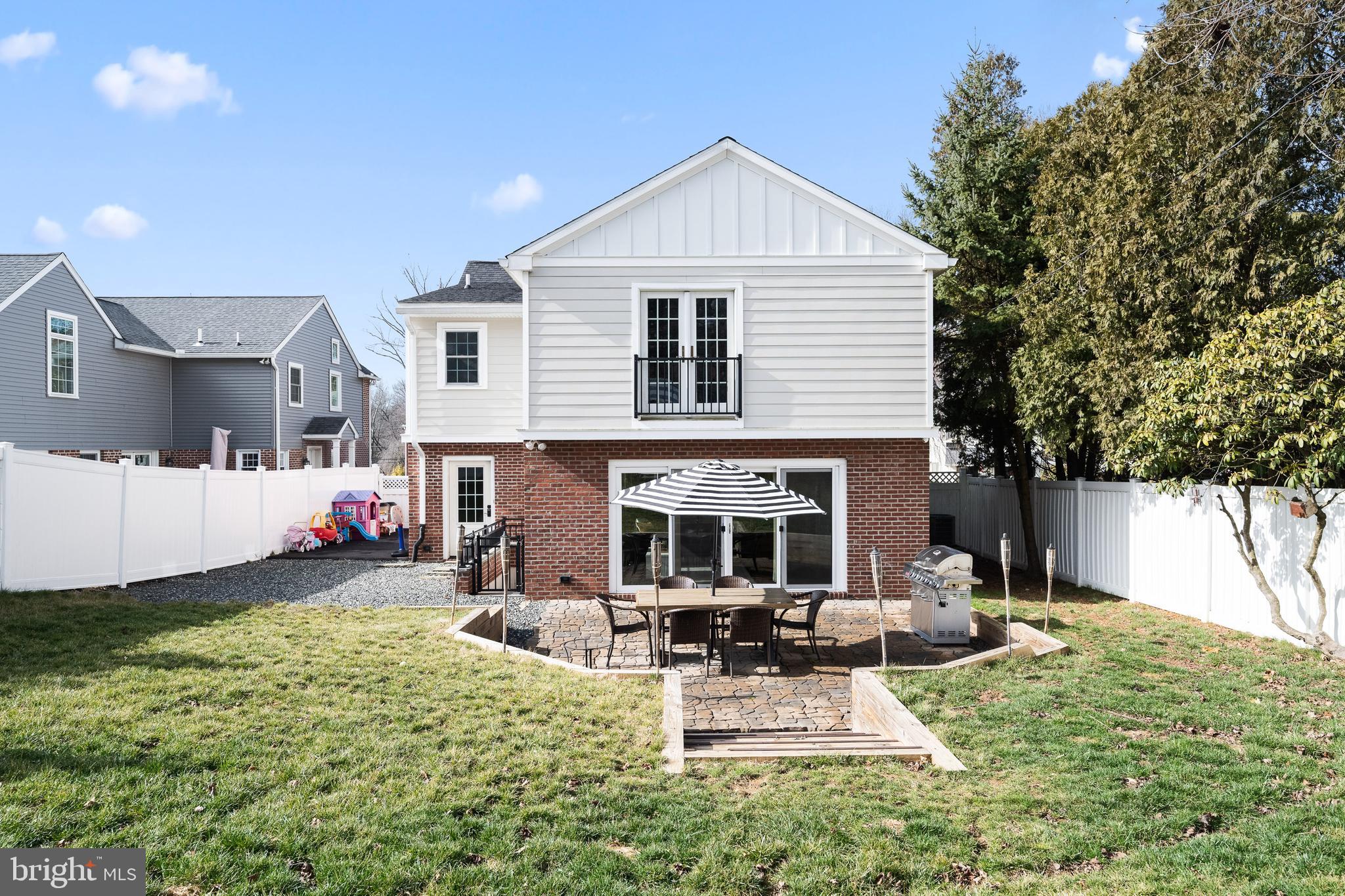 115 Barcladen Road Bryn Mawr, PA 19010 - Photo 37 of 39 a view of a house with backyard and sitting area