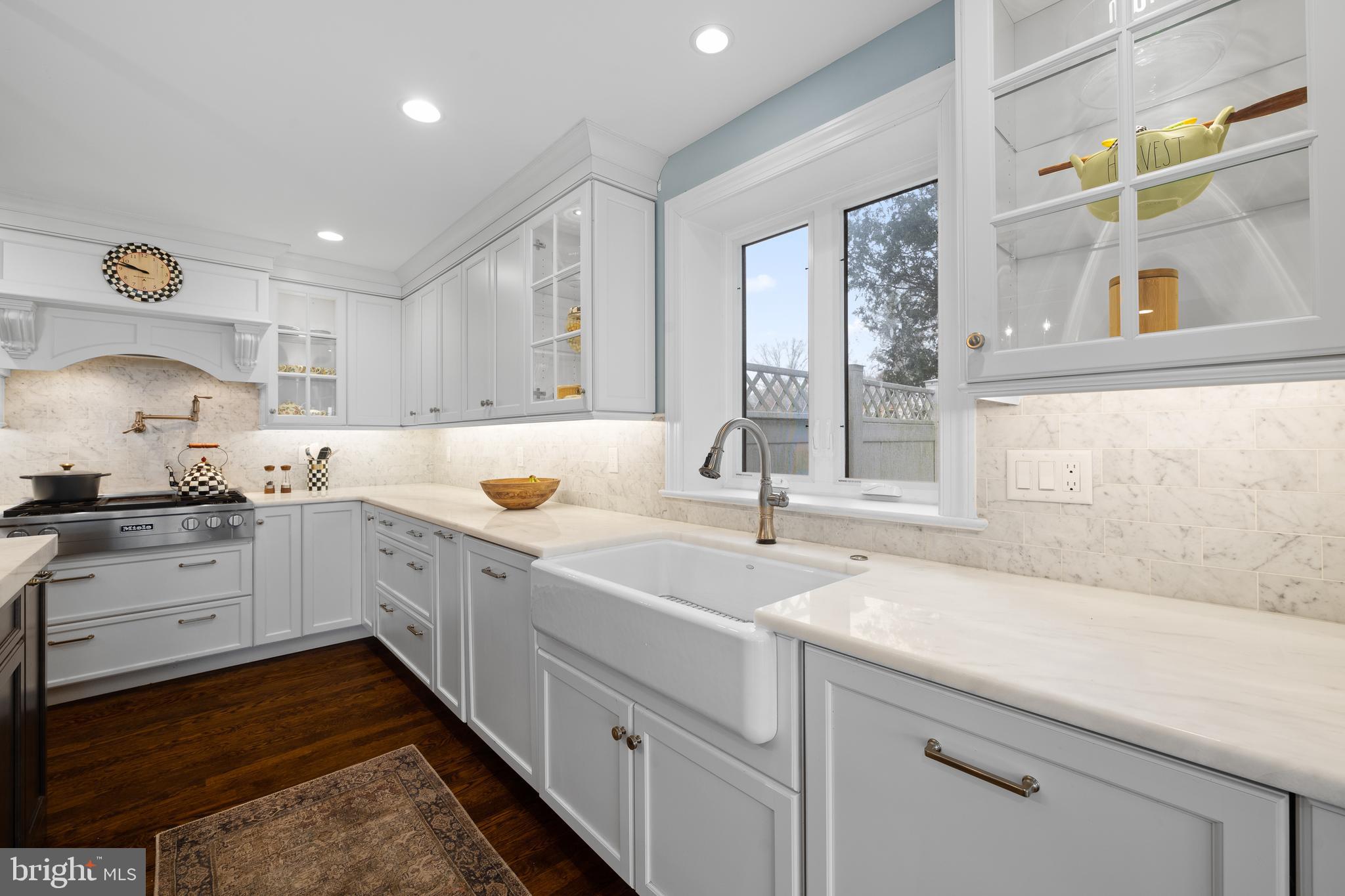 115 Barcladen Road Bryn Mawr, PA 19010 - Photo 6 of 39 a kitchen with a sink cabinets and window