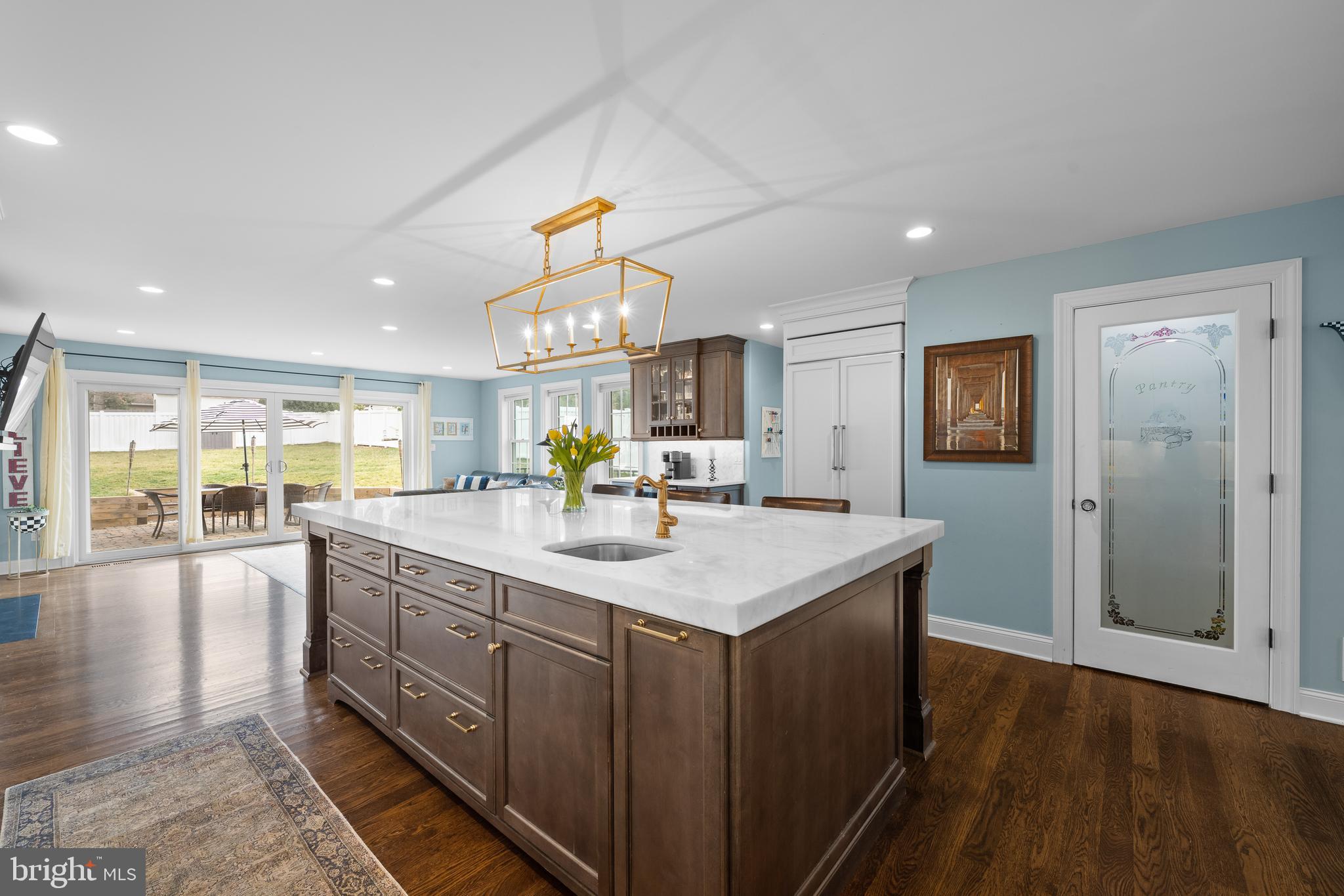 115 Barcladen Road Bryn Mawr, PA 19010 - Photo 7 of 39 a kitchen with sink stove and wooden floor