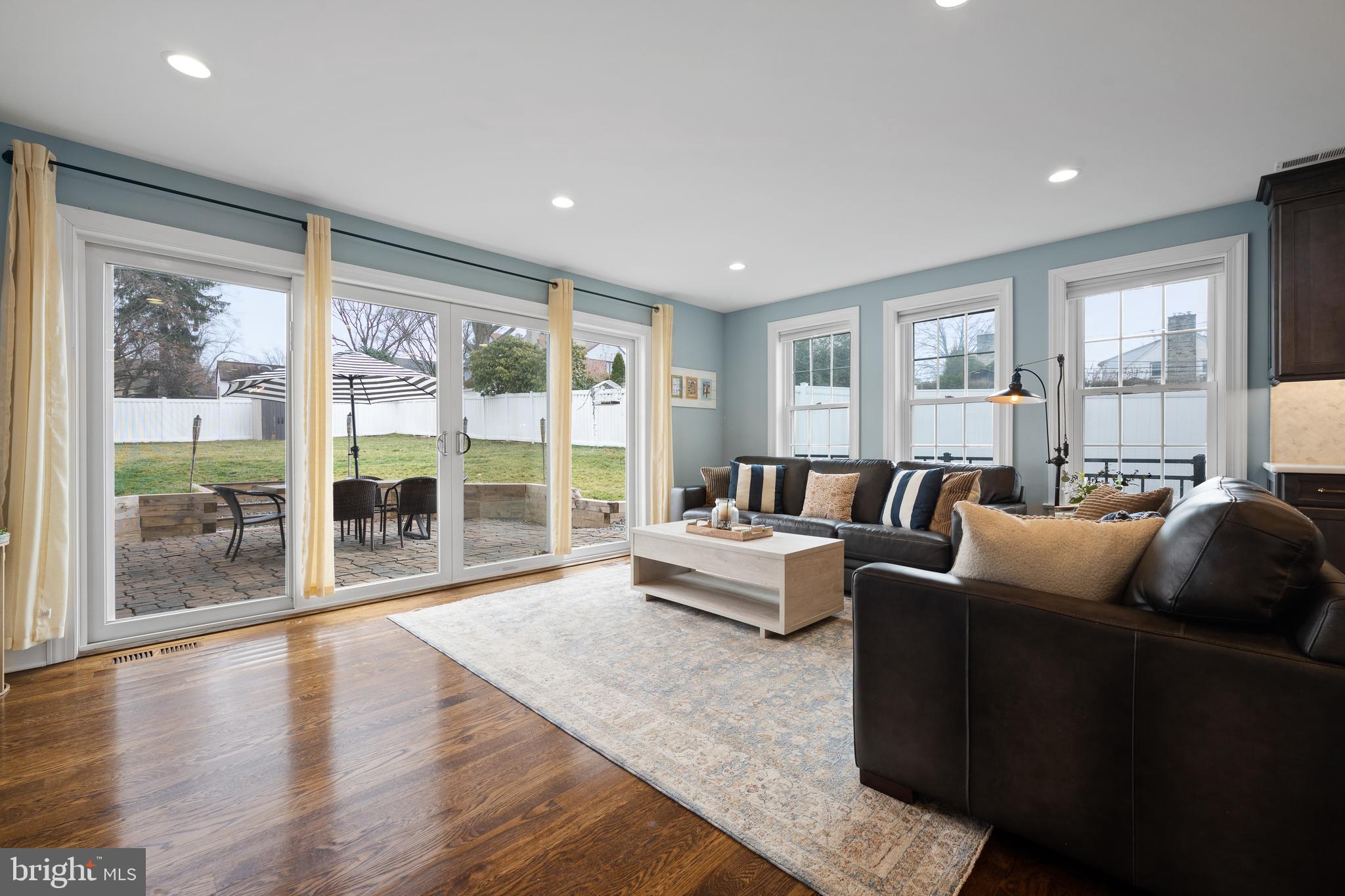 115 Barcladen Road Bryn Mawr, PA 19010 - Photo 10 of 39 a living room with furniture and a large window
