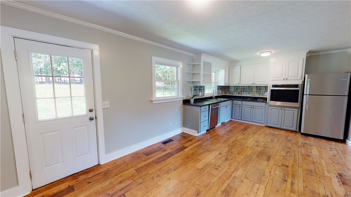 817 Johnson Road Central, SC 29630 - Photo 6 of 17 Kitchen open to back patio