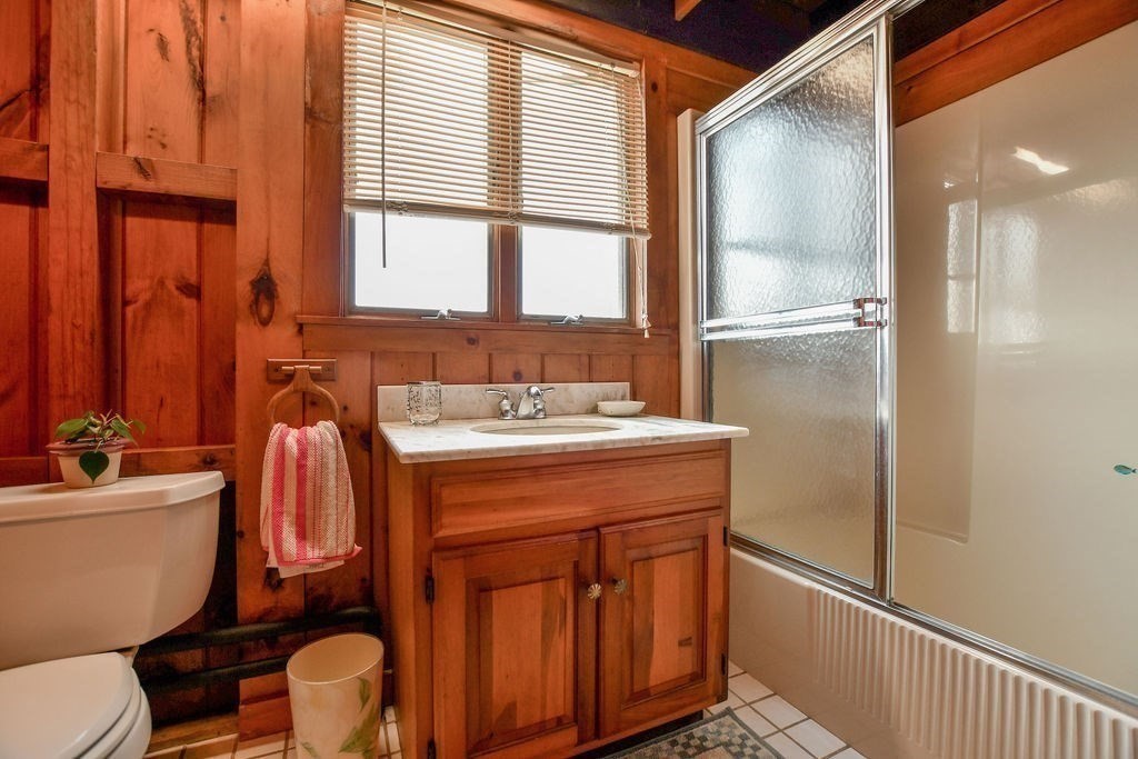 14 Sias Point Road Wareham, MA 02532 - Photo 25 of 42 a bathroom with a sink a toilet and tub