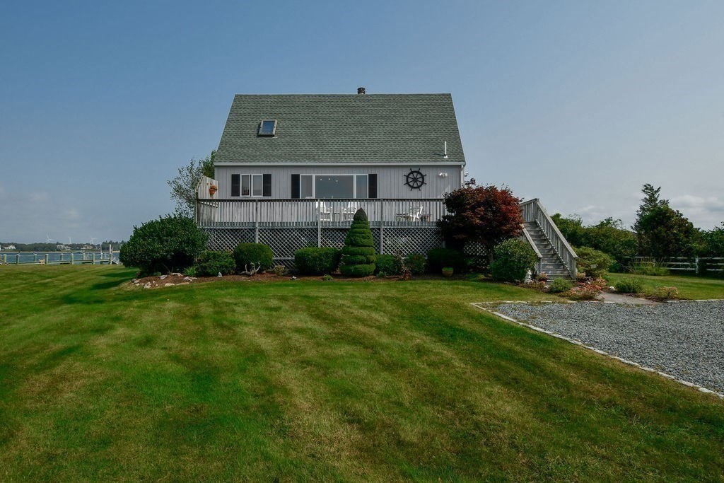 14 Sias Point Road Wareham, MA 02532 - Photo 34 of 42 a aerial view of a house next to a big yard