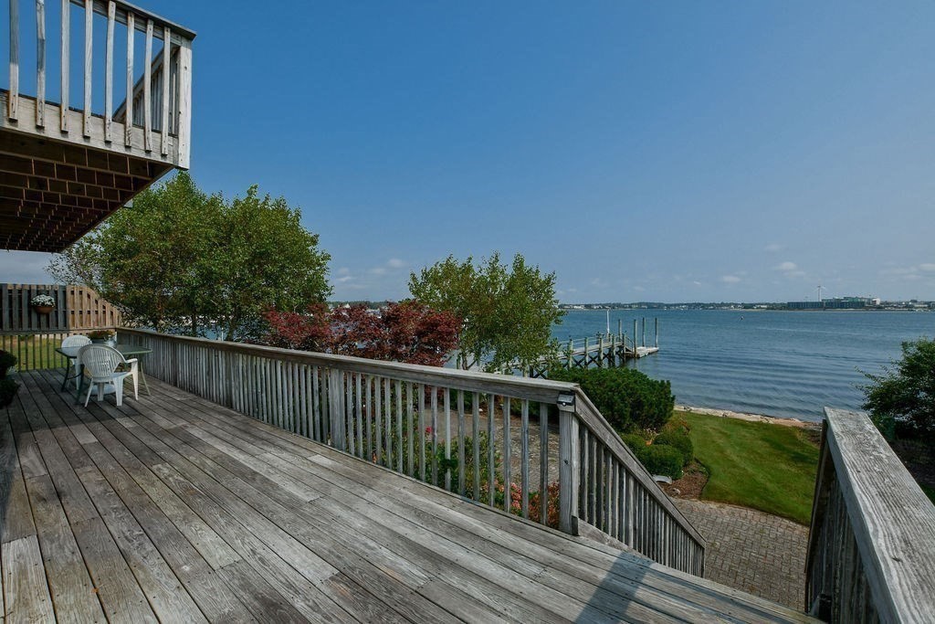 14 Sias Point Road Wareham, MA 02532 - Photo 7 of 42 a balcony with wooden floor and outdoor space
