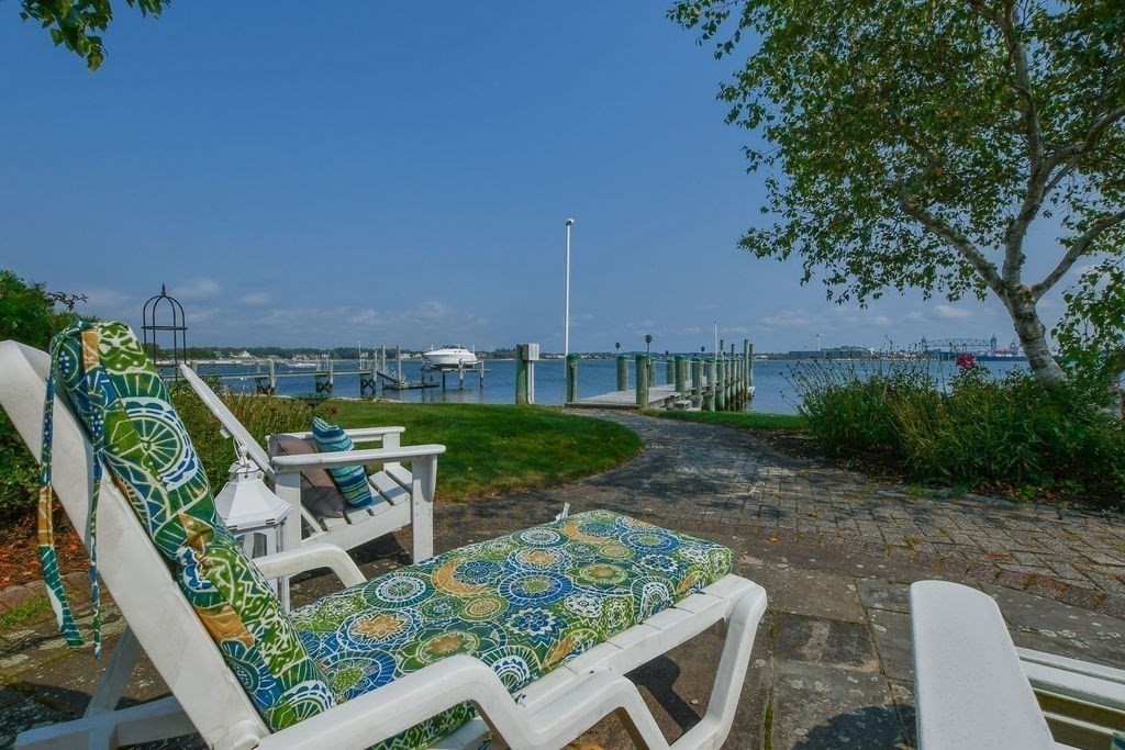 14 Sias Point Road Wareham, MA 02532 - Photo 10 of 42 a view of an chairs and table in patio