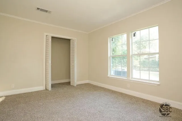 an empty room with windows