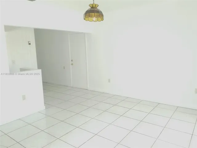 a view of a room with cabinets