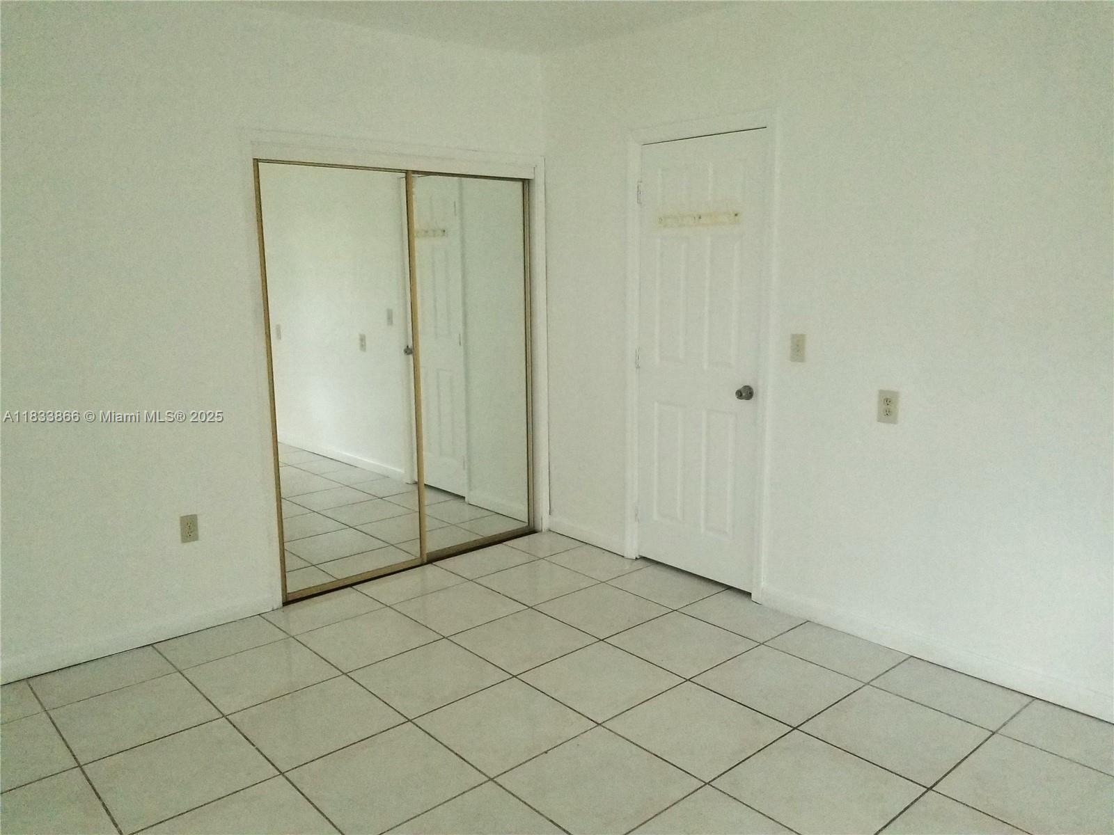 1240 Southwest 22nd Terrace, Unit 1 Miami, FL 33145 - Photo 9 of 14 a view of an empty room