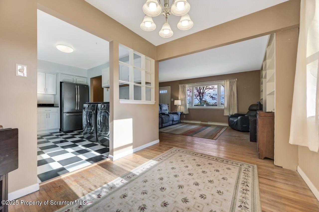 524 Knapp Road Clarks Summit, PA 18411 - Photo 12 of 45 a living room with furniture and a fireplace