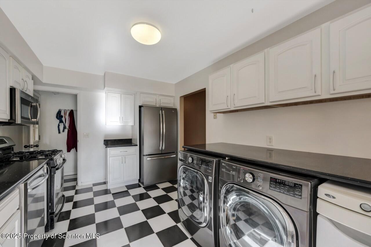 524 Knapp Road Clarks Summit, PA 18411 - Photo 13 of 45 a kitchen with a refrigerator and a sink