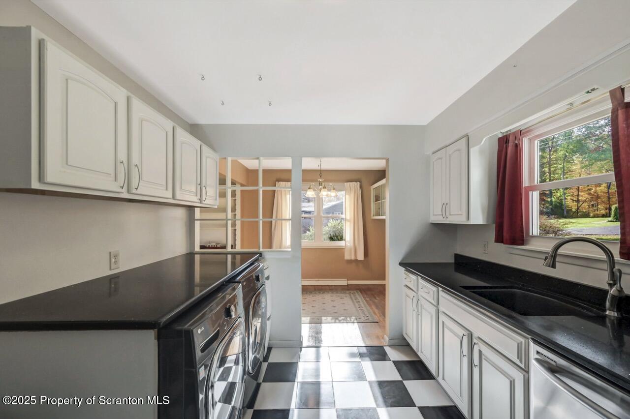 524 Knapp Road Clarks Summit, PA 18411 - Photo 15 of 45 a kitchen with granite countertop a sink and a stove