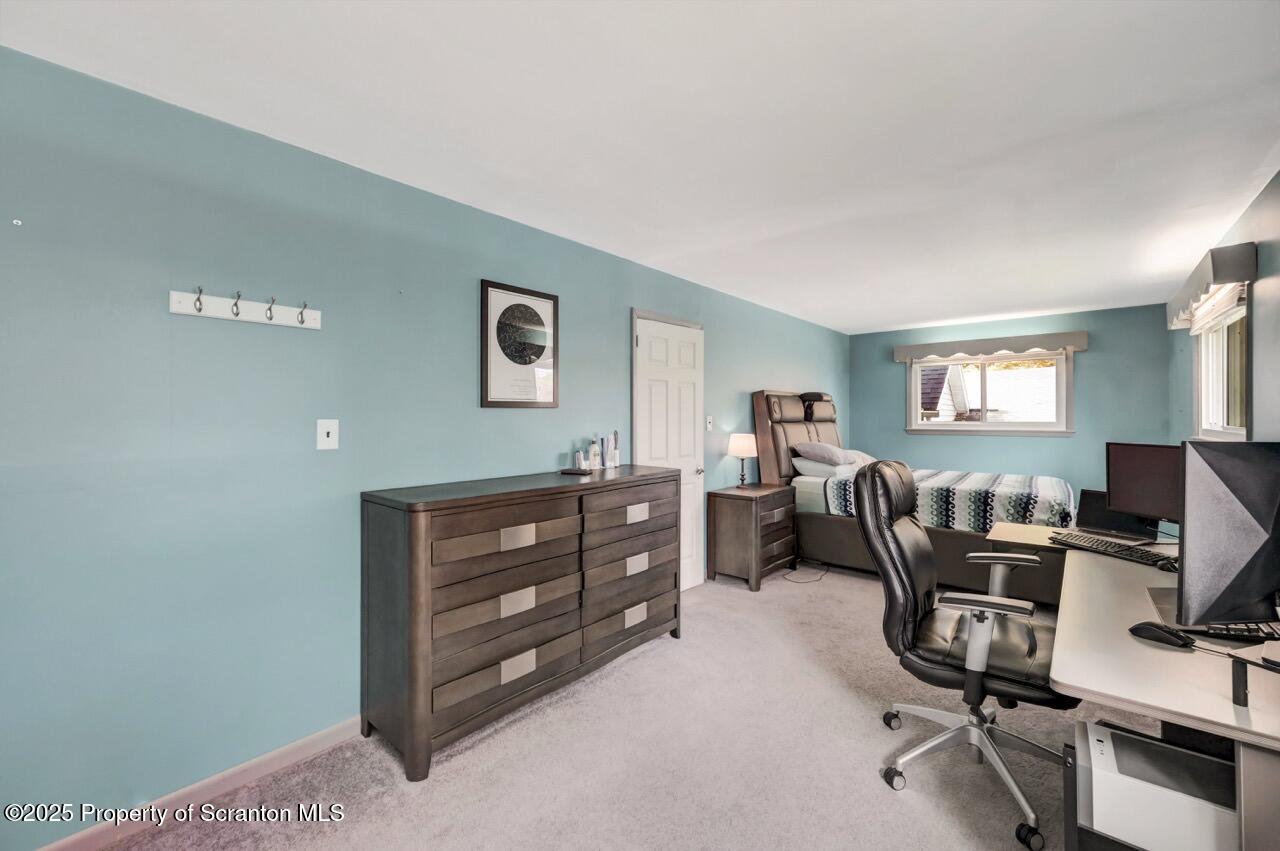 524 Knapp Road Clarks Summit, PA 18411 - Photo 20 of 45 a bedroom with a workspace