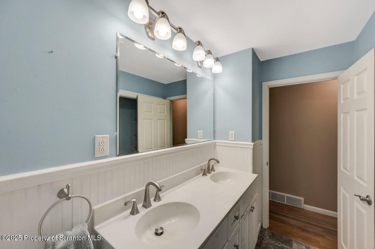 524 Knapp Road Clarks Summit, PA 18411 - Photo 22 of 45 a bathroom with a sink and a mirror