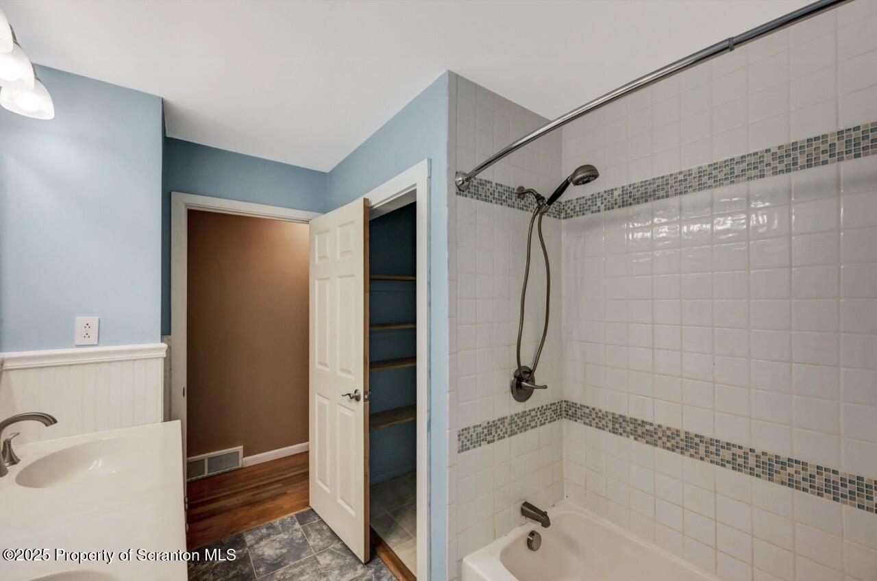 524 Knapp Road Clarks Summit, PA 18411 - Photo 23 of 45 a bathroom with a glass shower door