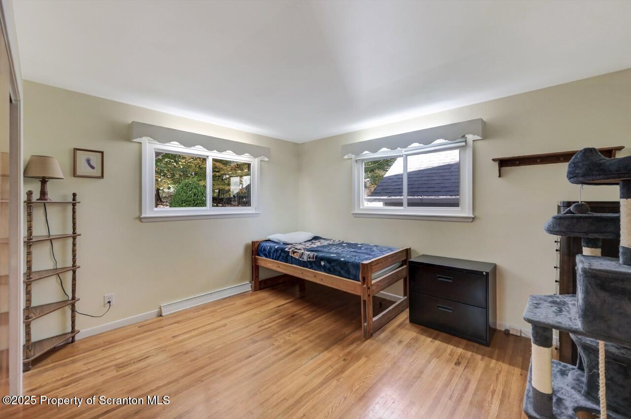 524 Knapp Road Clarks Summit, PA 18411 - Photo 24 of 45 a living room with furniture and a wooden floor