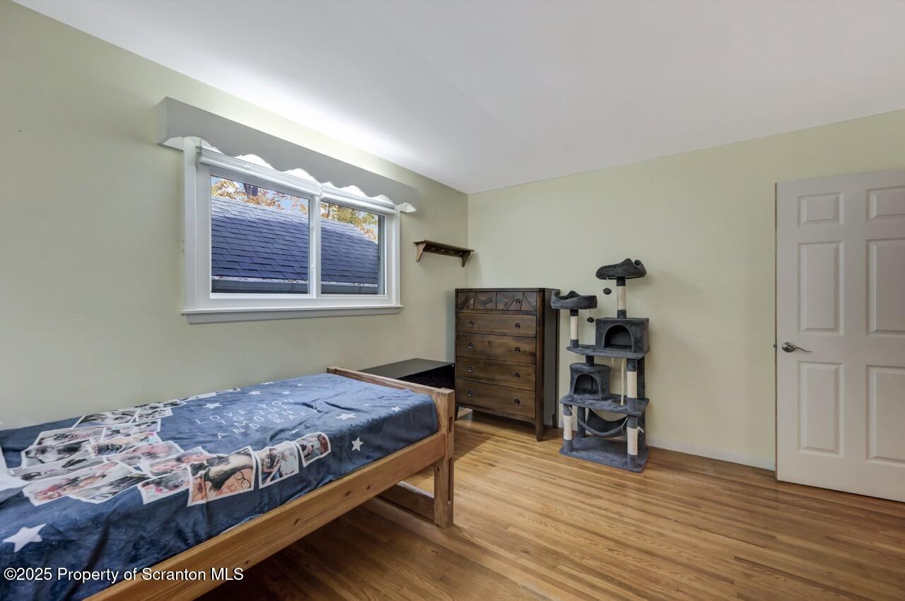 524 Knapp Road Clarks Summit, PA 18411 - Photo 26 of 45 a bedroom with furniture and a window