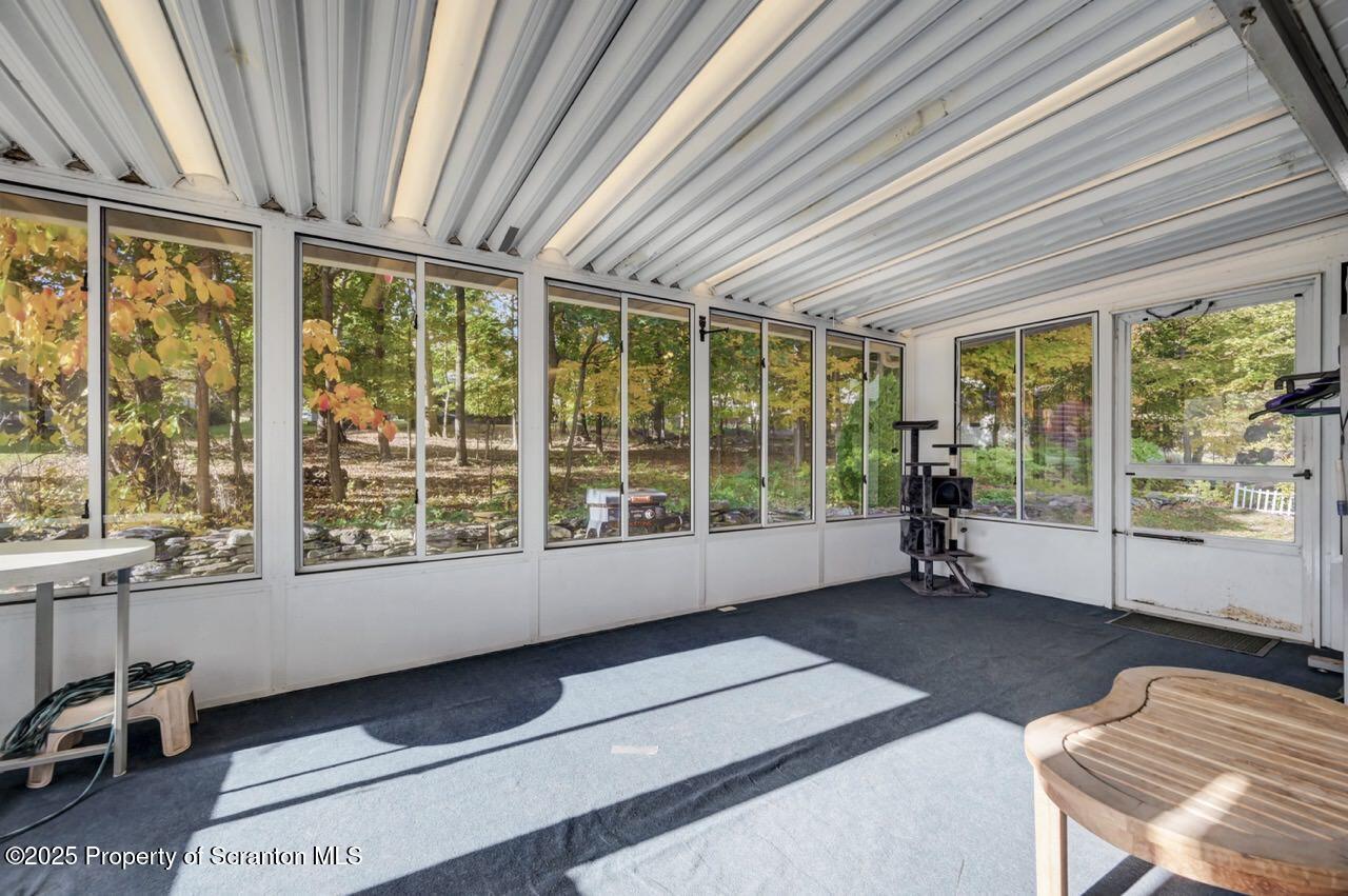 524 Knapp Road Clarks Summit, PA 18411 - Photo 27 of 45 a living room with furniture and a large window