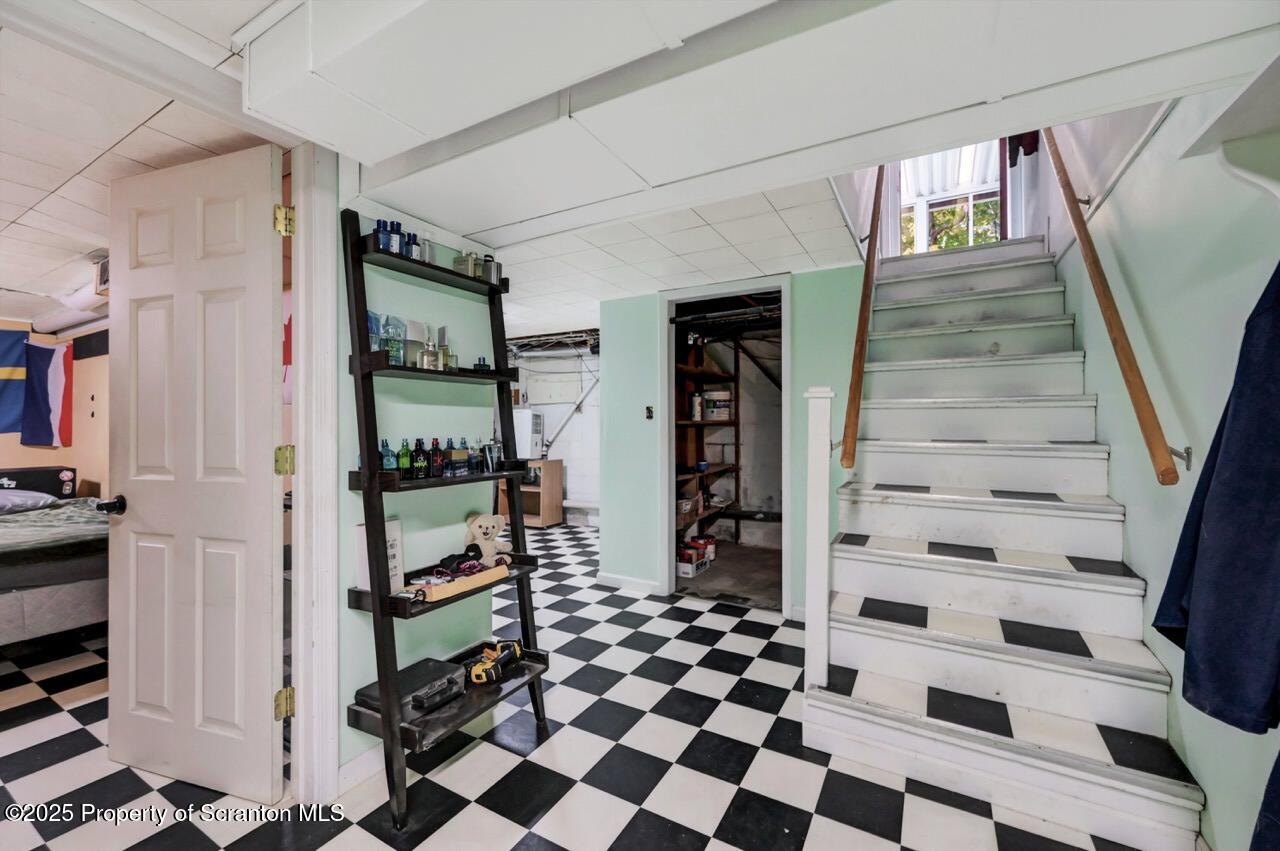 524 Knapp Road Clarks Summit, PA 18411 - Photo 30 of 45 a view of walk in closet with clothes and shoes