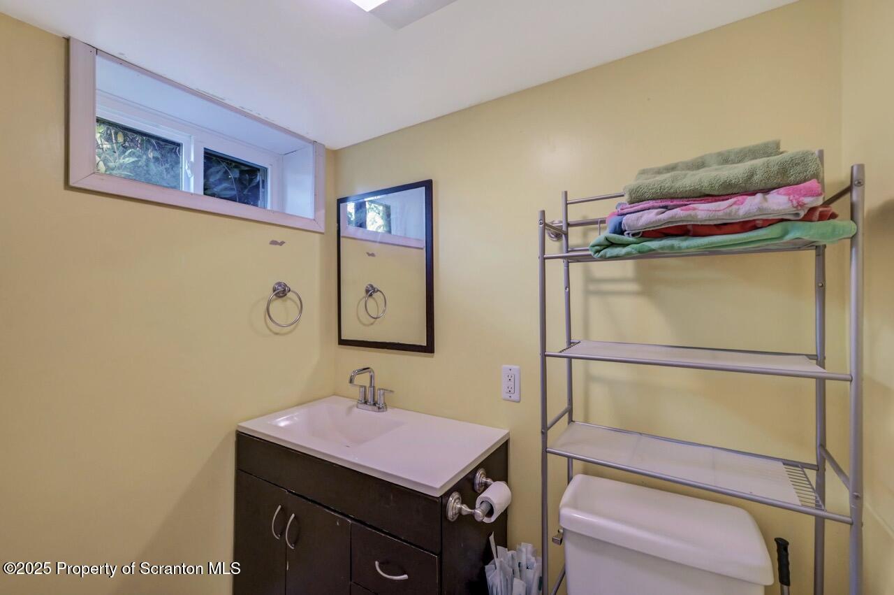 524 Knapp Road Clarks Summit, PA 18411 - Photo 34 of 45 a room with a door and a table