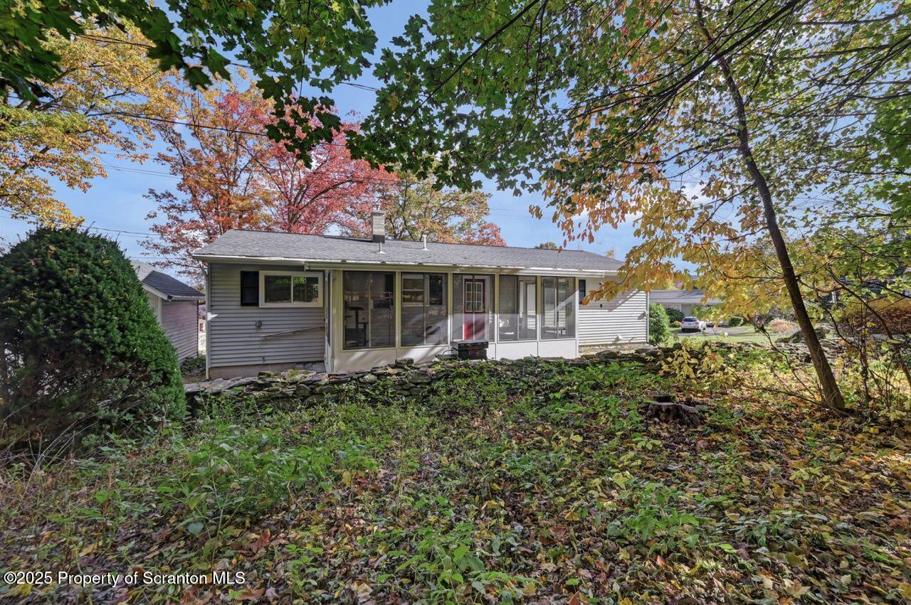 524 Knapp Road Clarks Summit, PA 18411 - Photo 40 of 45 a front view of a house with a garden