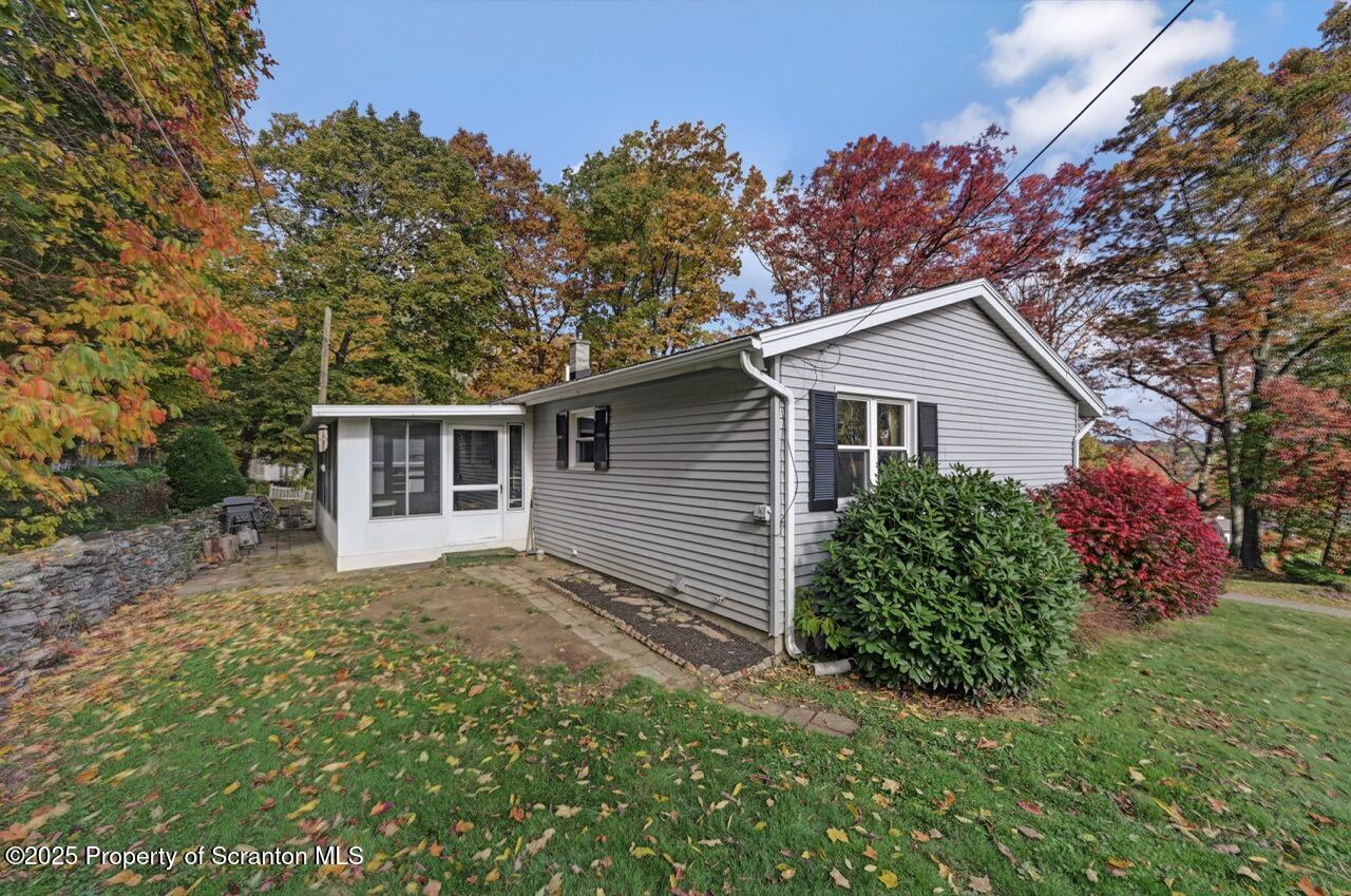 524 Knapp Road Clarks Summit, PA 18411 - Photo 41 of 45 a view of a house with a yard and potted plants