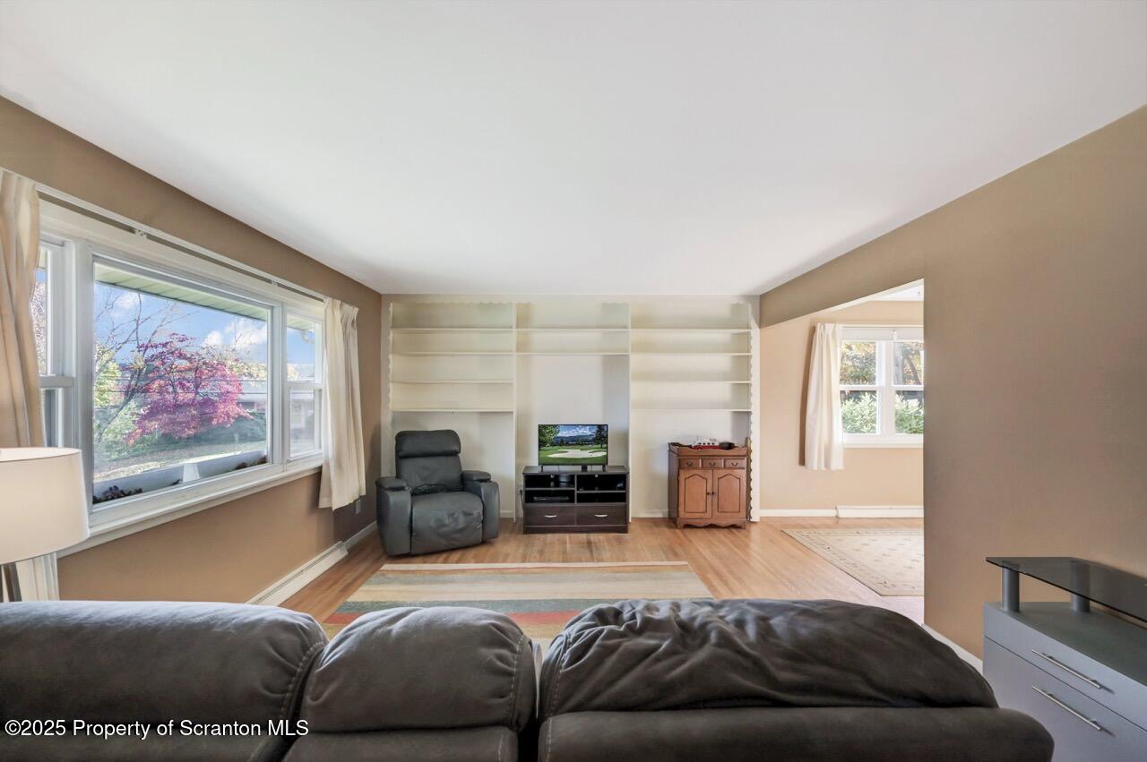 524 Knapp Road Clarks Summit, PA 18411 - Photo 5 of 45 a living room with furniture and a large window