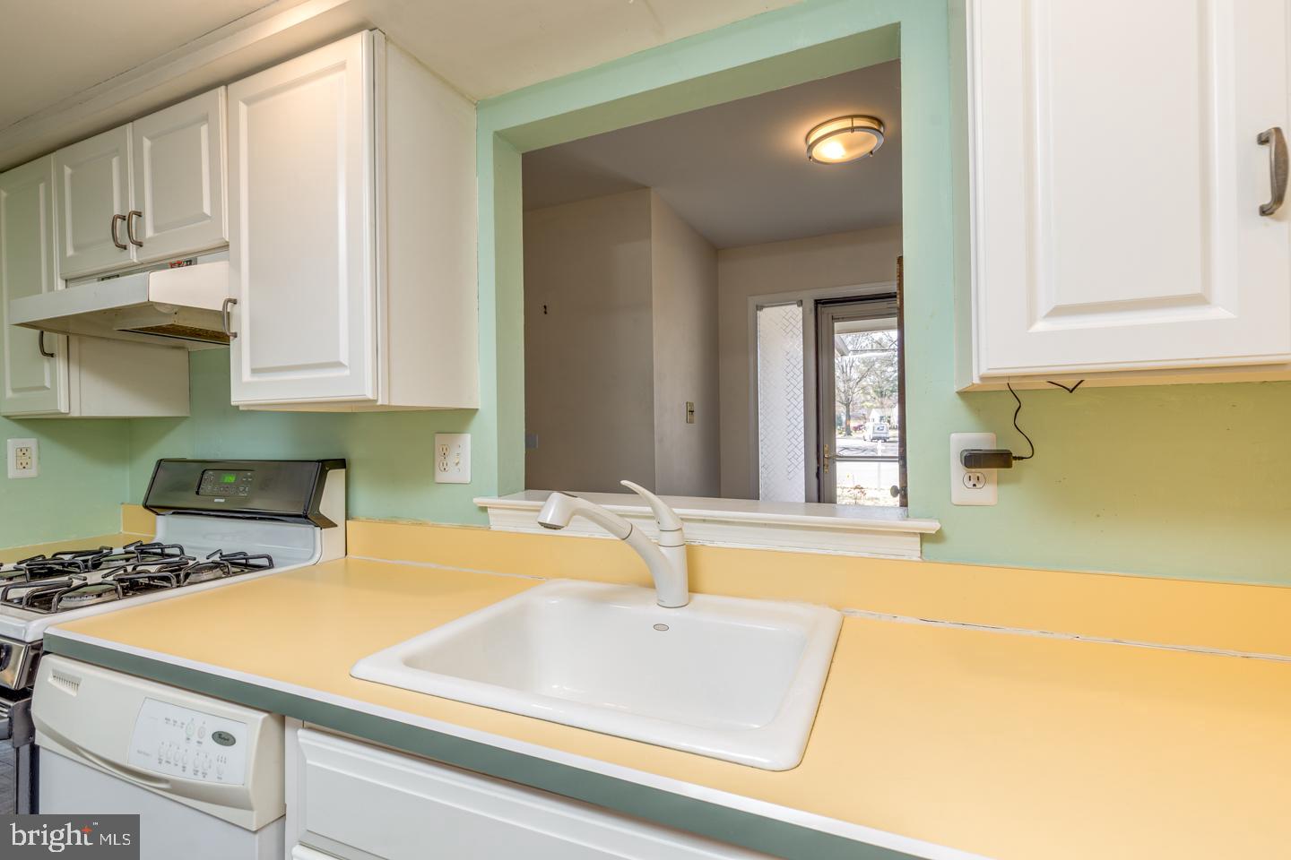 923 Chesterfield Road Haddonfield, NJ 08033 - Photo 13 of 31 a kitchen with sink and cabinets
