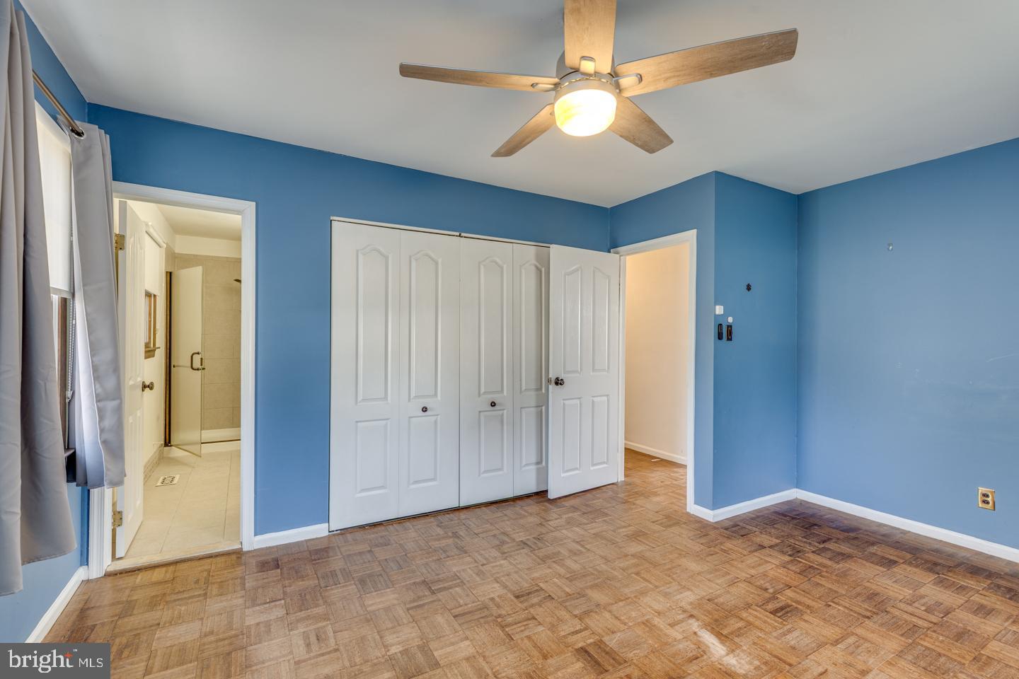 923 Chesterfield Road Haddonfield, NJ 08033 - Photo 24 of 31 an empty room with closet and a chandelier fan