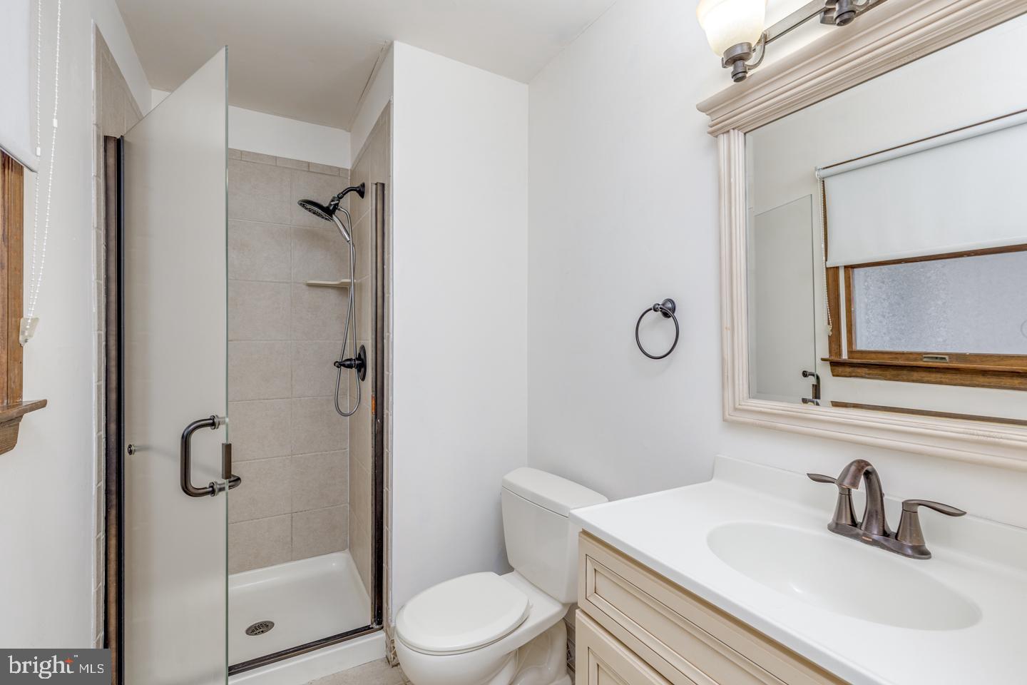 923 Chesterfield Road Haddonfield, NJ 08033 - Photo 26 of 31 a bathroom with a sink a toilet and shower