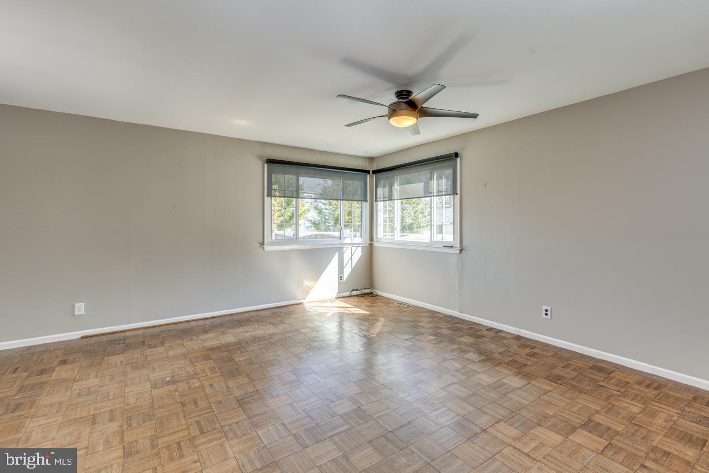 923 Chesterfield Road Haddonfield, NJ 08033 - Photo 8 of 31 an empty room with windows and fan