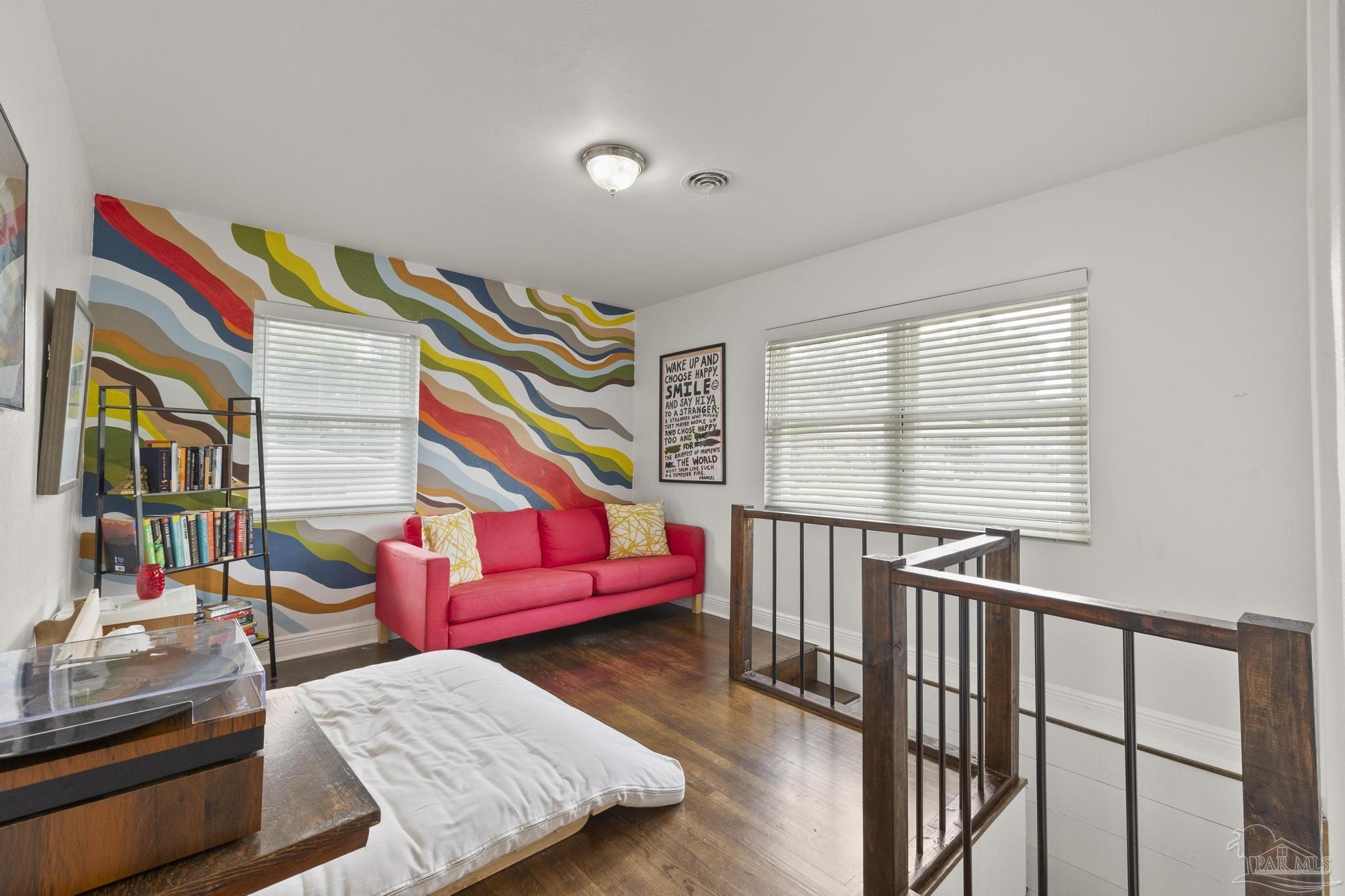 200 Clematis Street Pensacola, FL 32503 - Photo 14 of 33 a living room with furniture and a window