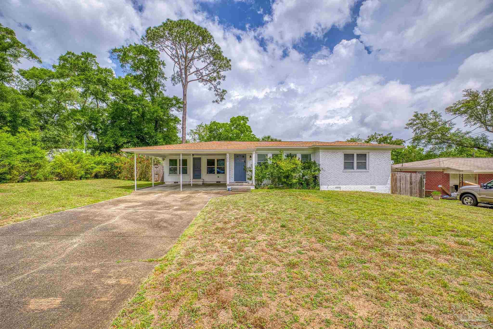 200 Clematis Street Pensacola, FL 32503 - Photo 32 of 33 front view of a house with a big yard