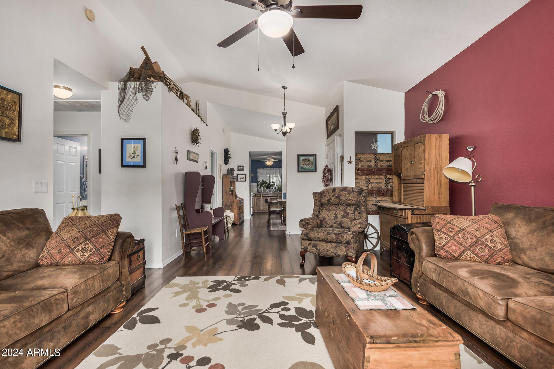9124 West Calavar Road Peoria, AZ 85381 - Photo 11 of 25 a living room with furniture and wooden floor