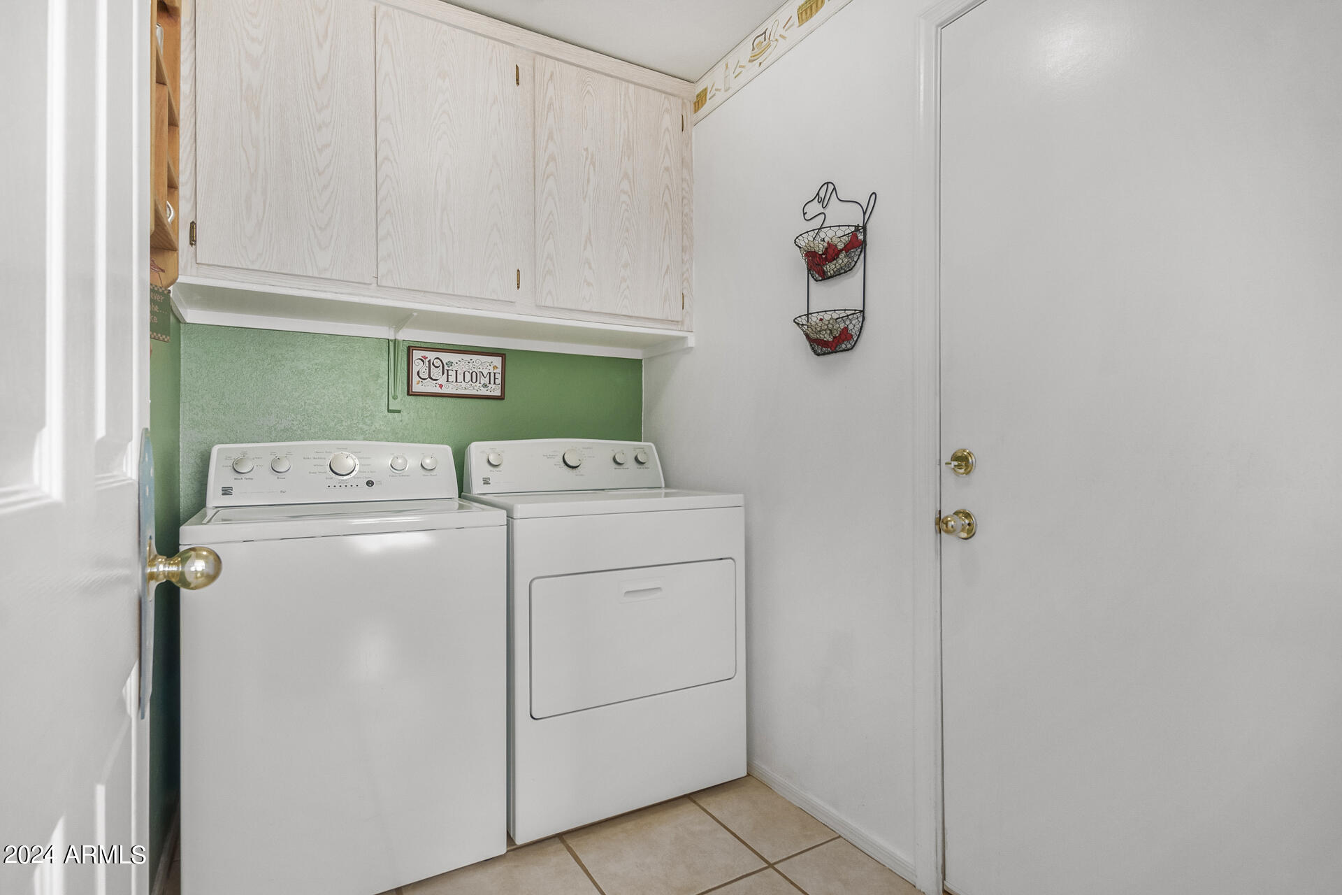 9124 West Calavar Road Peoria, AZ 85381 - Photo 8 of 25 a utility room with dryer and washer