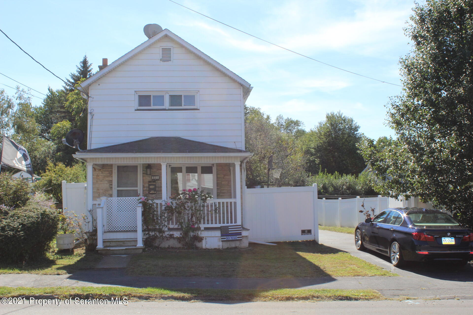 518 Spring Street Moosic, PA 18507 - Photo 1 of 26 a front view of a house with garden