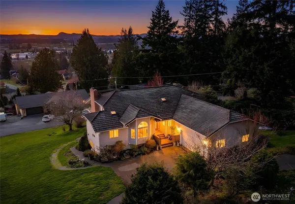 an aerial view of a house with a garden