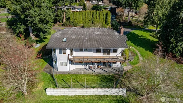 an aerial view of a house with a garden