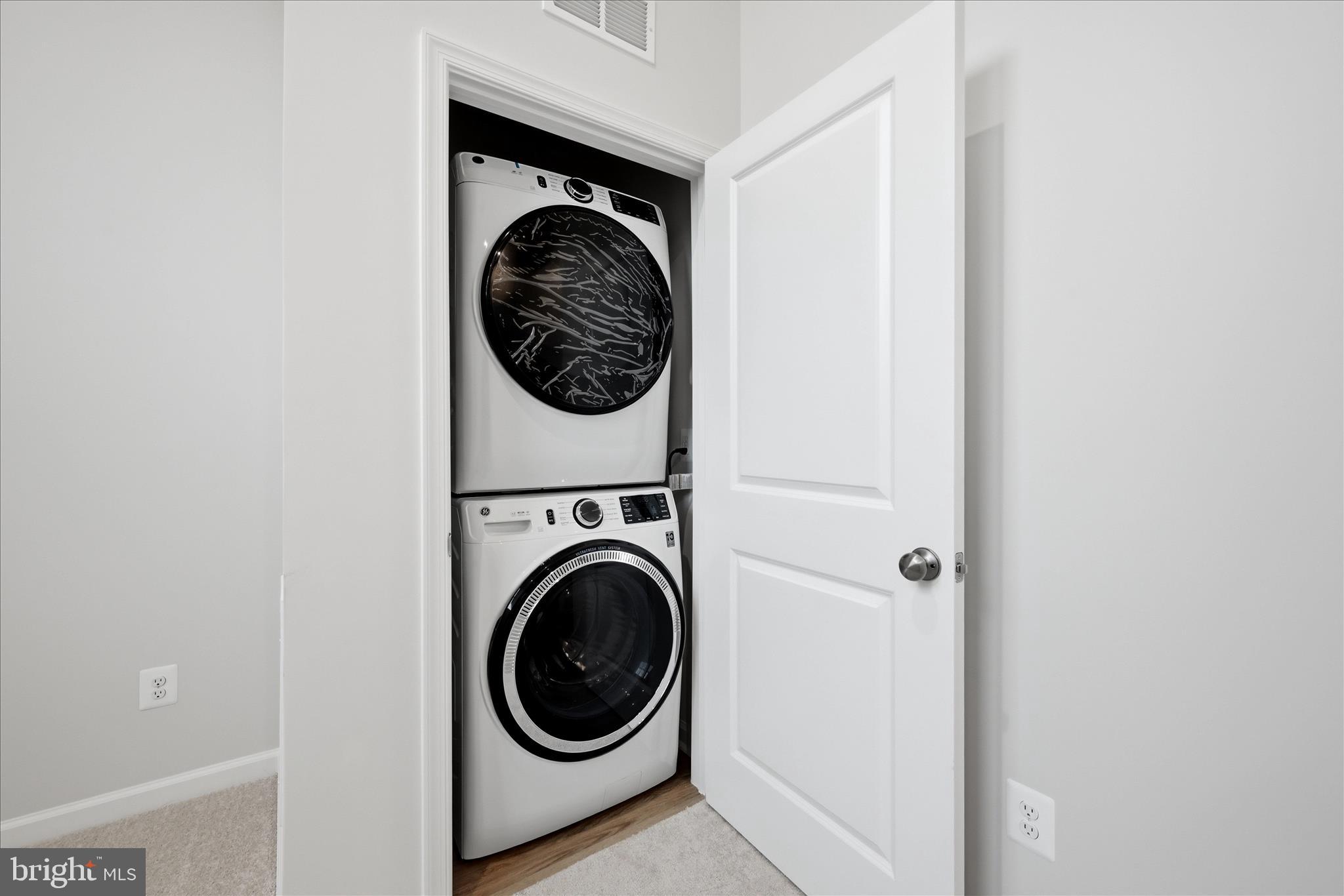 300 Presidents Pointe Avenue Ranson, WV 25438 - Photo 7 of 24 a close up view of a washer and dryer