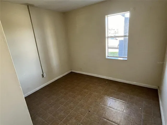 an empty room with a window