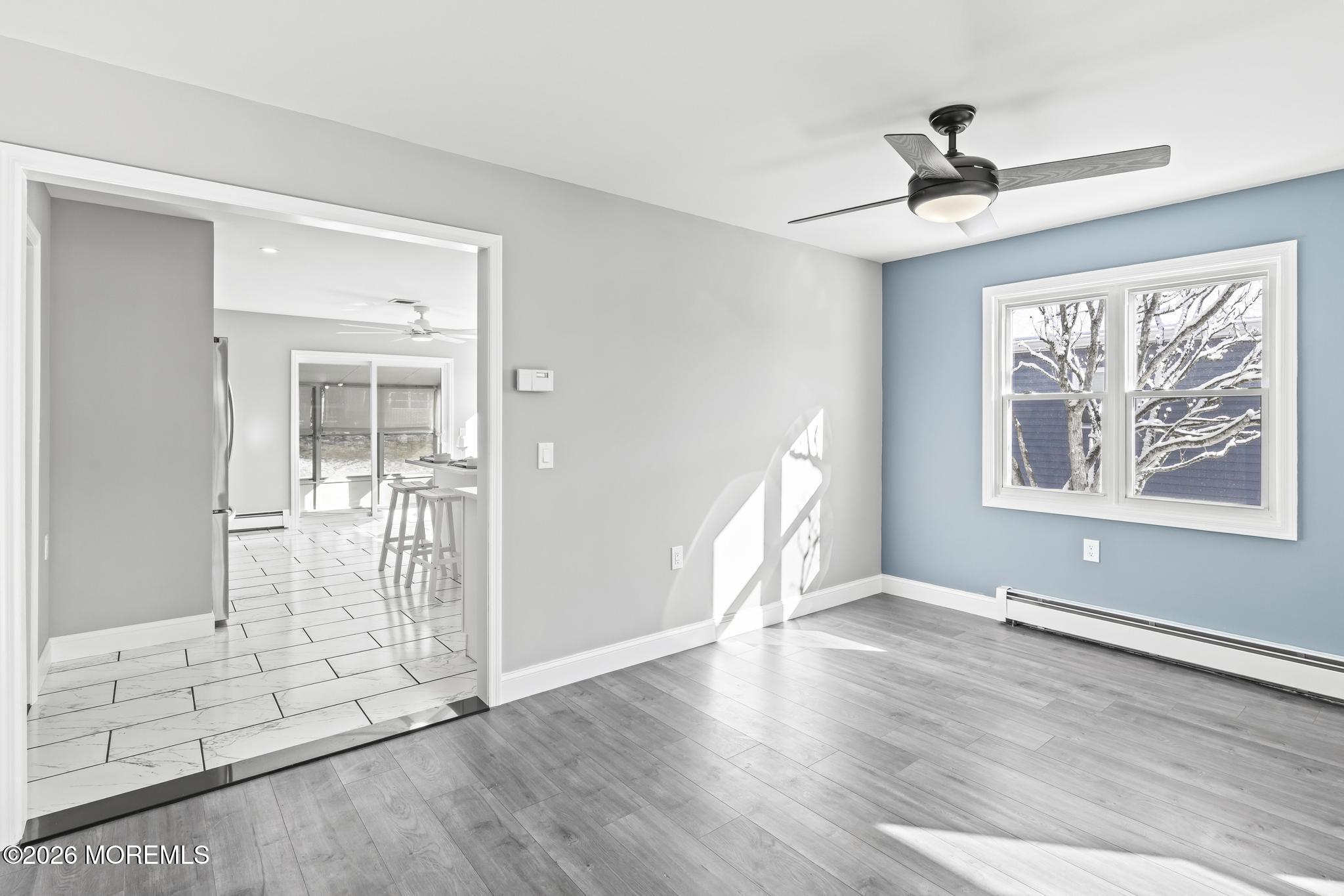 3 Muirhead Street Toms River, NJ 08757 - Photo 12 of 34 a view of an empty room with wooden floor and a window