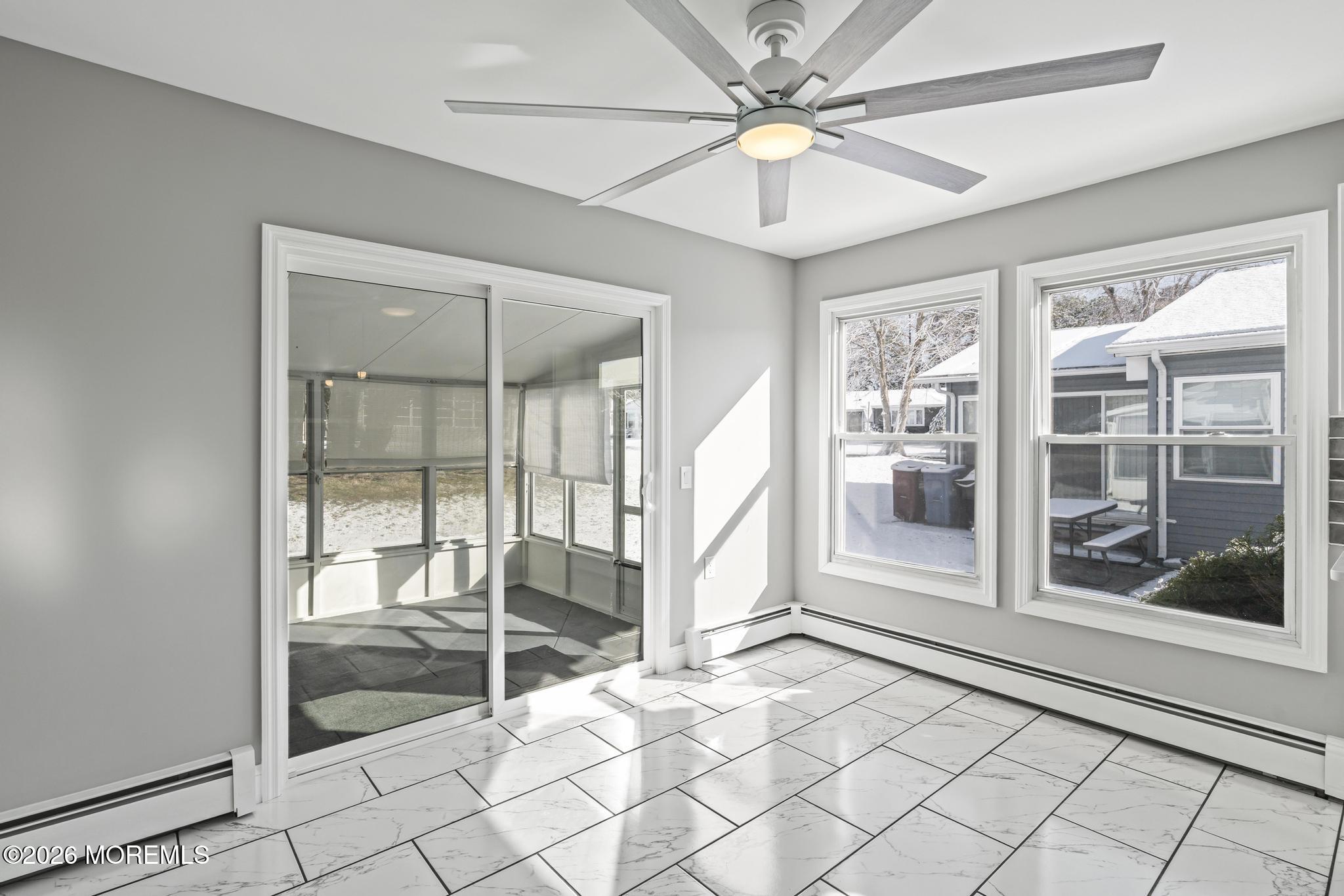 3 Muirhead Street Toms River, NJ 08757 - Photo 17 of 34 a living room with a large window and white walls