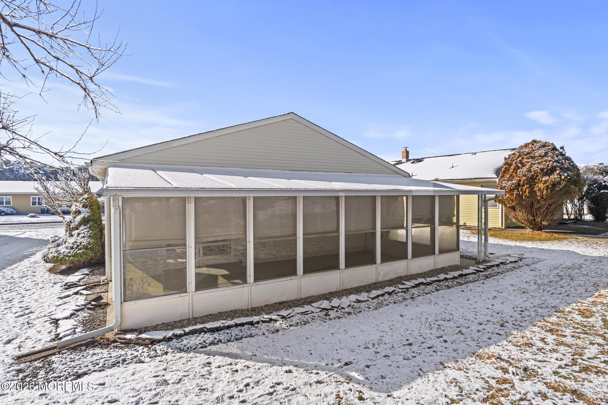 3 Muirhead Street Toms River, NJ 08757 - Photo 32 of 34 a house with a large window and yard